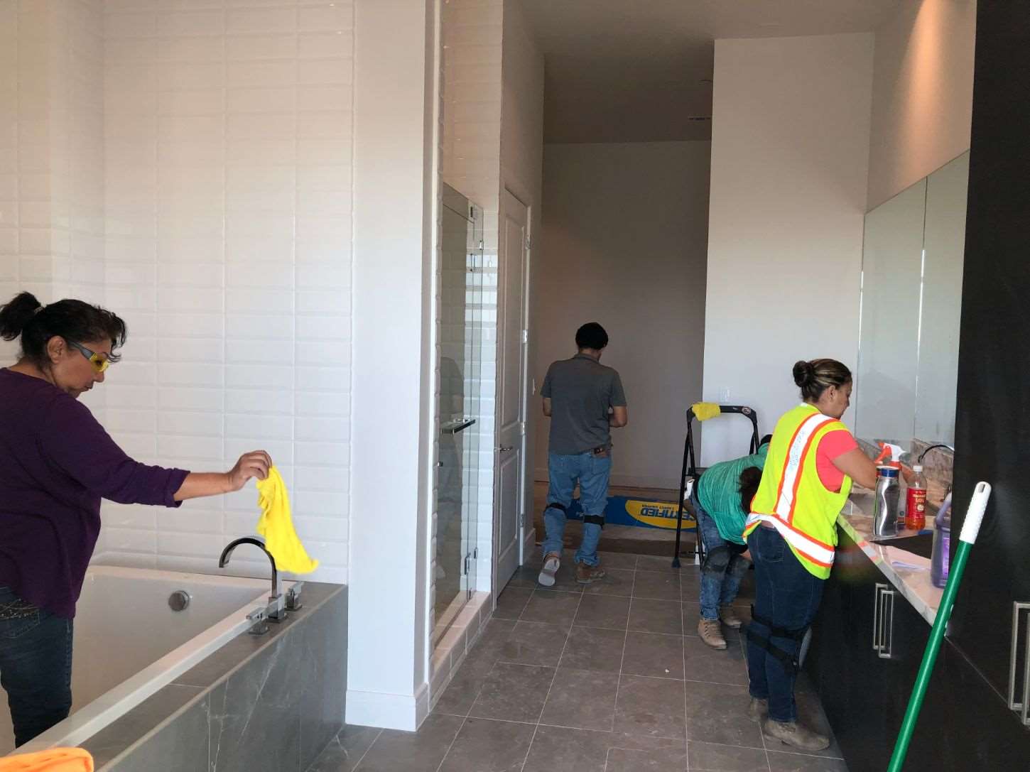Houston commercial construction cleanup crew performing detailed floor work