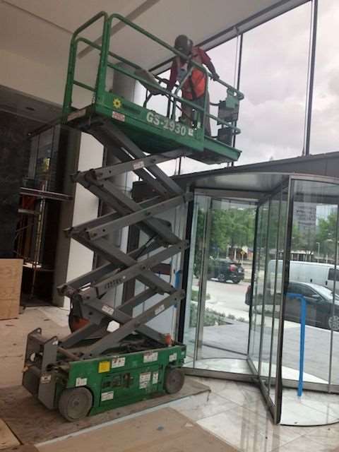 Specialty access work during a Houston post-construction cleanup